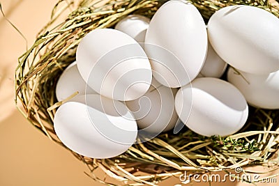 Wicker basket with farm natural white eggs. Stock Photo