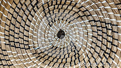 Wicker basket lid with black and white wire decoration Stock Photo