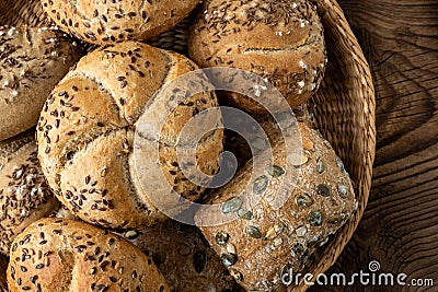 Wicker basket with selection of breads and pastries. Assortment of baked products Stock Photo