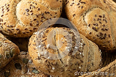 Wicker basket with selection of breads and pastries. Assortment of baked products Stock Photo