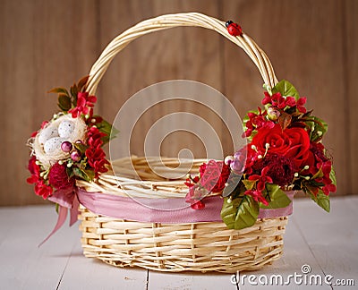 Wicker Designer Basket decorated with flower Stock Photo