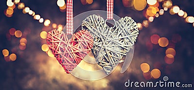 Wicker hearts made of straw, Vintage styled St. Valentine`s Day art design. Beautiful Valentine card design. Stock Photo