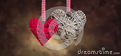 Wicker hearts made of straw, Vintage styled St. Valentine`s Day art design. Beautiful Valentine card design. Stock Photo