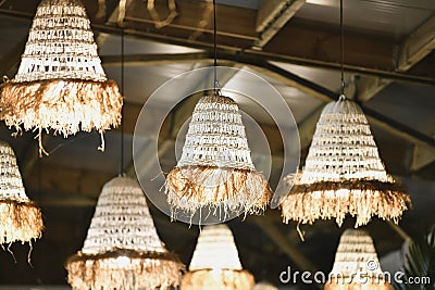 The Wicker lamps hanging from the ceiling Stock Photo
