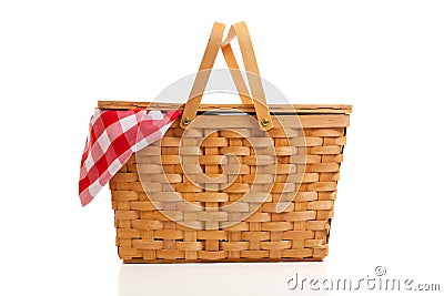 Wicker Picnic Basket with Gingham Cloth Stock Photo