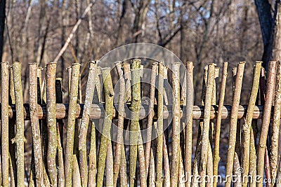 Wicker rustic wooden fence Stock Photo