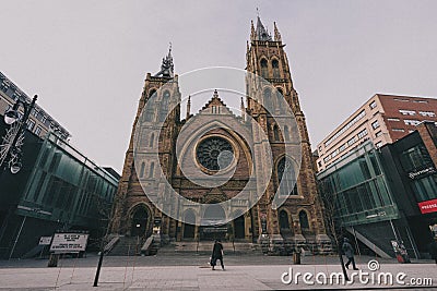 Wide angle shot of the street and Saint James United Church Editorial Stock Photo