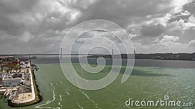 Wide top view 25 de Abril Bridge in Lisbon over Tagus river Stock Photo