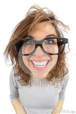 Wide angle view of a geek woman with glasses smiling Stock Photo