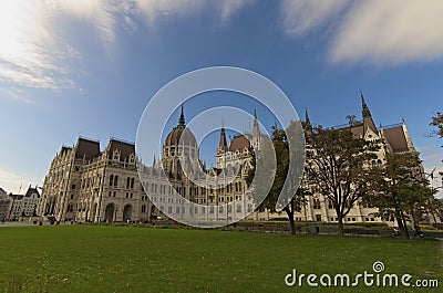 Wide-angle view of Hungarian Parliament Building against blue sky. One of the most beautiful buildings in Budapest Editorial Stock Photo