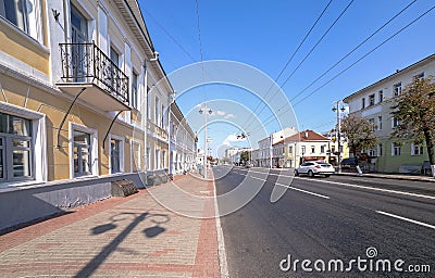 A wide angle view of a long street. Editorial Stock Photo