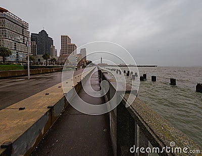 Wide angle view San Francisco waterfront on the embarcadero on a rainy day. Editorial Stock Photo