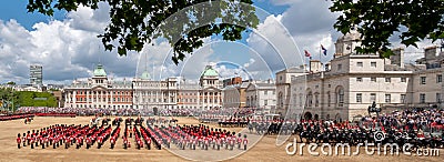 Wide angle view of the Trooping the Colour military parade at Horse Guards Parade, London UK, with Household Division soldiers. Stock Photo