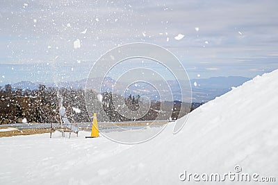 Snowmaking maching spraying snow, Miyazaki, Japan Stock Photo