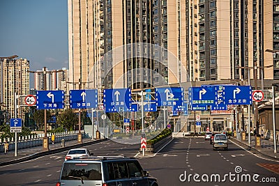 Highway leading to high residential blocks in Chongqing city suburb Editorial Stock Photo