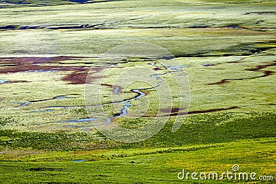 The wide green valley with the rivers Stock Photo