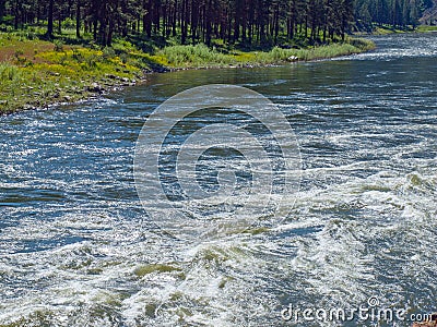 Wide Mountain River Cuts a Valley - Clark Fork River Stock Photo