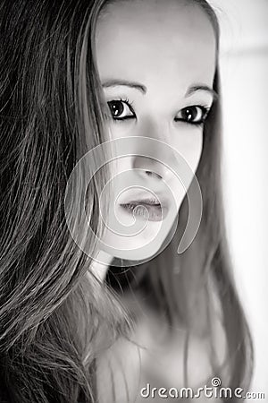 Wide open aperature portrait of beautiful brunette Stock Photo