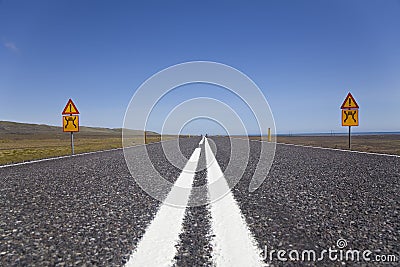 Wide Open Road With Warning Signs Stock Photo