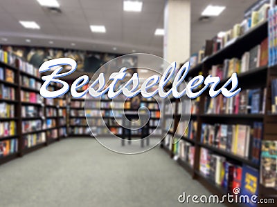 Wide out of focus view of the inside of a bookstore with the word Bestsellers in the foreground Stock Photo