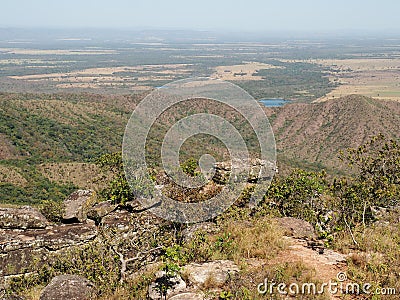 Wide scenic view of mountain fields during a sunny day Stock Photo