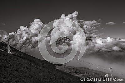 A Wide Scenic View to the Ropeway with Giant Clouds on Background Stock Photo