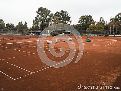 Rural, abandoned tennis court in autumn Stock Photo