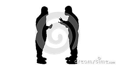 Silhouette Two doctors giving high five after a successful talk. Stock Photo