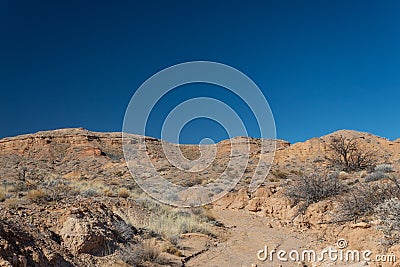 Wide trail leading to a ridge in the Chihuahuan desert of New Mexico, USA Stock Photo