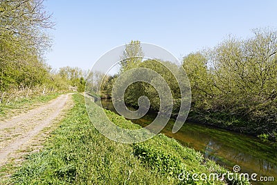 Wide treelined footpath high above the River Idle Stock Photo