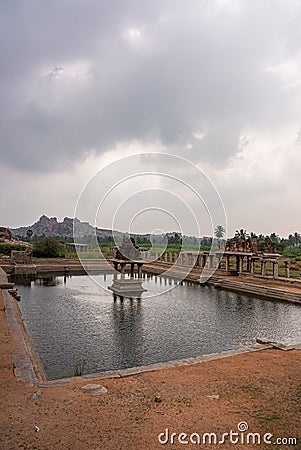 Wide view on Krishna Tank with shrine, Hampi, Karnataka, India Stock Photo