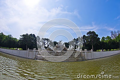 Wide view of Neptune fountain in front of Schenbrunn park and palace in Vienna Editorial Stock Photo