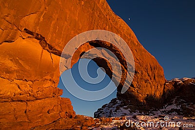 Wide view of North Window arch at sunset in Winter Stock Photo