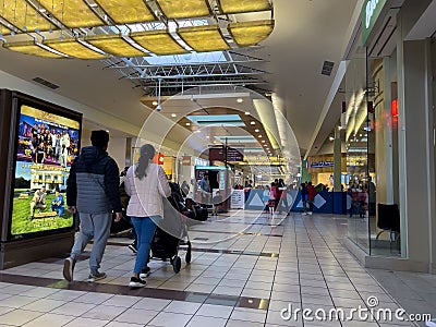 Lynnwood, WA USA - circa January 2023: Wide view of people shopping inside the Alderwood Mall Editorial Stock Photo