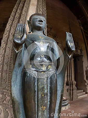 Wider low-angle photo of Laotian Buddha Stock Photo