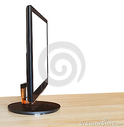 Widescreen display cut out screen on wood table Stock Photo