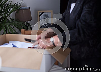 Widow packing stuff Stock Photo