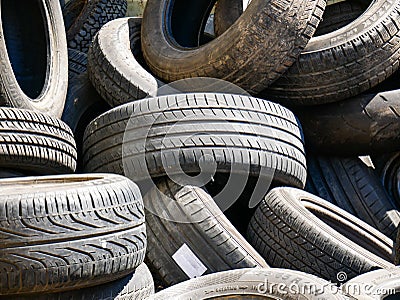 Wien/Austria - june 4 2019: close up of a group of old auto tyres inside a container to be send to a recycling plant in vienna Editorial Stock Photo