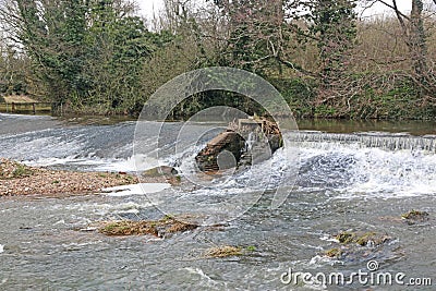 Wier on the River Culm, Devon Stock Photo