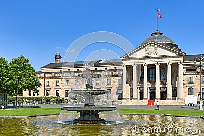 Wiesbaden, Germany - Fountain in public park called `Bowling Green` in front of convention center called Kurhaus Editorial Stock Photo