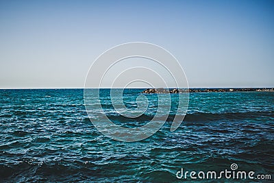 Wiev of Mediterranian sea. Blue water and rocks. Stock Photo