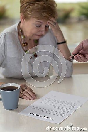 Wife and divorce decree Stock Photo