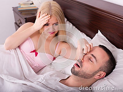 Wife and husband snoring in sleep Stock Photo