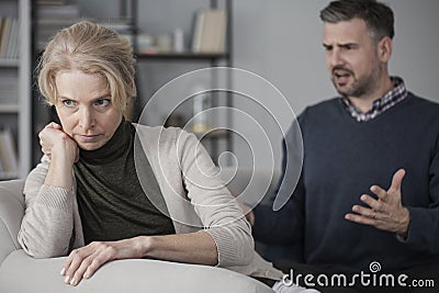 Wife and nervous husband Stock Photo