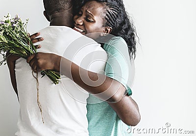 Wife receives a bouquet of flowers from her husband Stock Photo