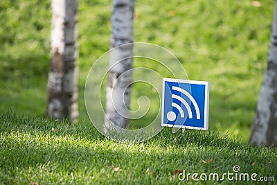 Wifi free area sign in a park. Stock Photo