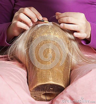 Wig Maker Working in her Workshop. Stock Photo