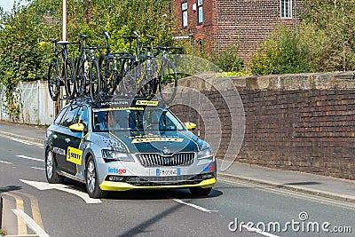 WIGAN, UK 14 SEPTEMBER 2019: A photograph documenting the Mitchelton-SCOTT team support vehicle passing along the route of the Editorial Stock Photo