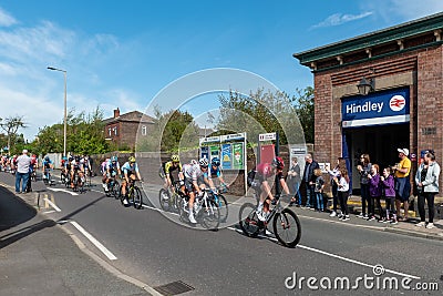 WIGAN, UK 14 SEPTEMBER 2019: A photograph documenting the riders of the Tour of Britain race as it passes through Hindley, in Editorial Stock Photo