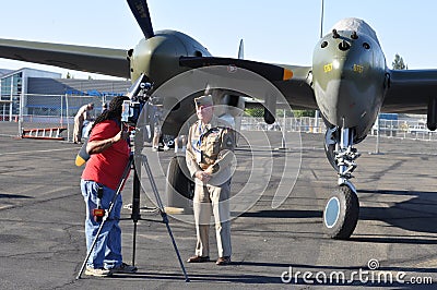 Wilbur Richardson in front of P-38 Lightning Editorial Stock Photo